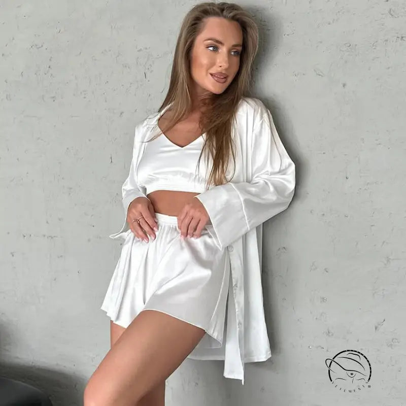 Woman in white satin three-piece loungewear set for home wear fashion