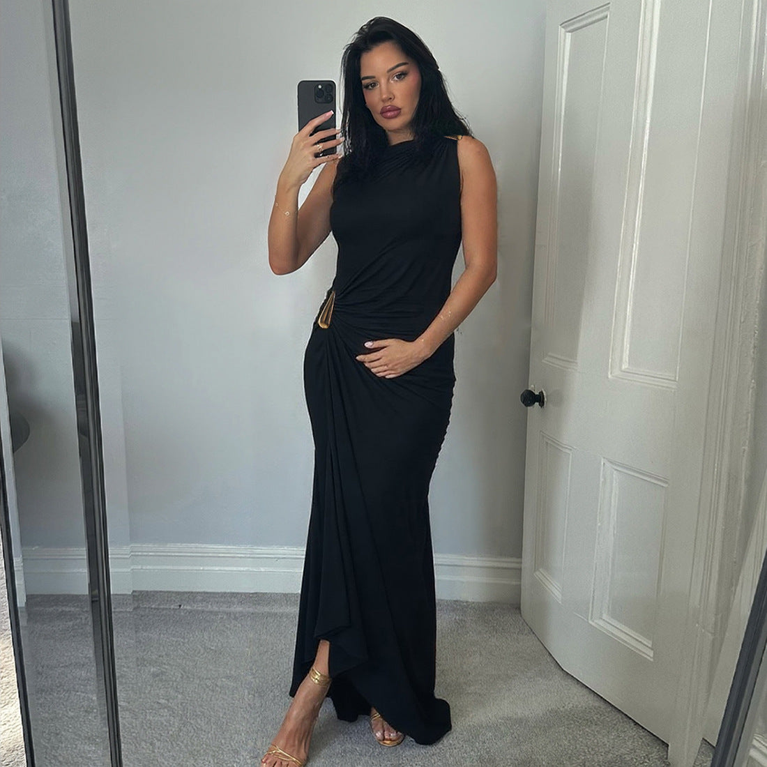 Elegant langry black sleeveless maxi dress with high slit and gold belt
