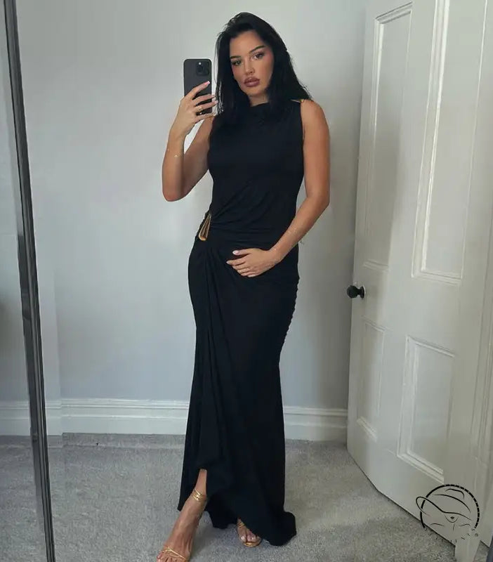 Elegant langry black sleeveless maxi dress with high slit and gold belt