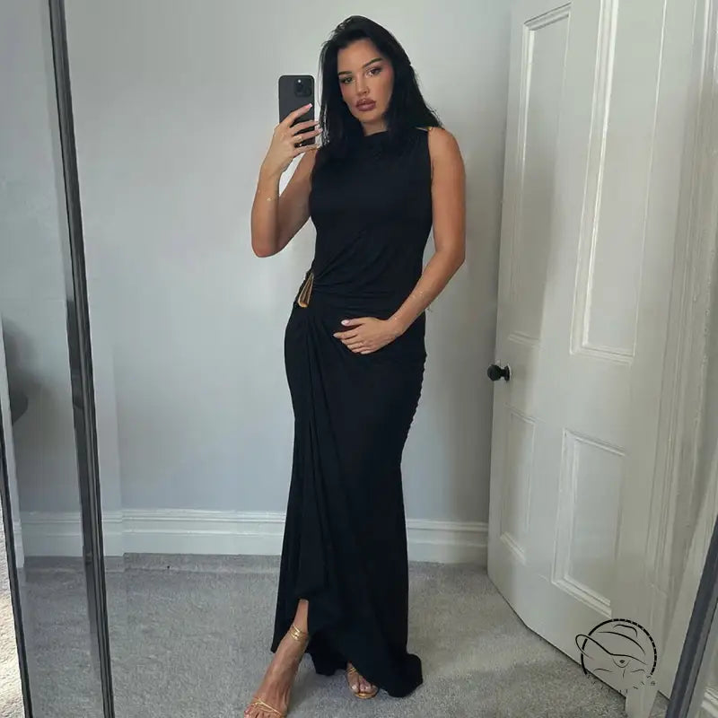 Elegant langry black sleeveless maxi dress with high slit and gold belt