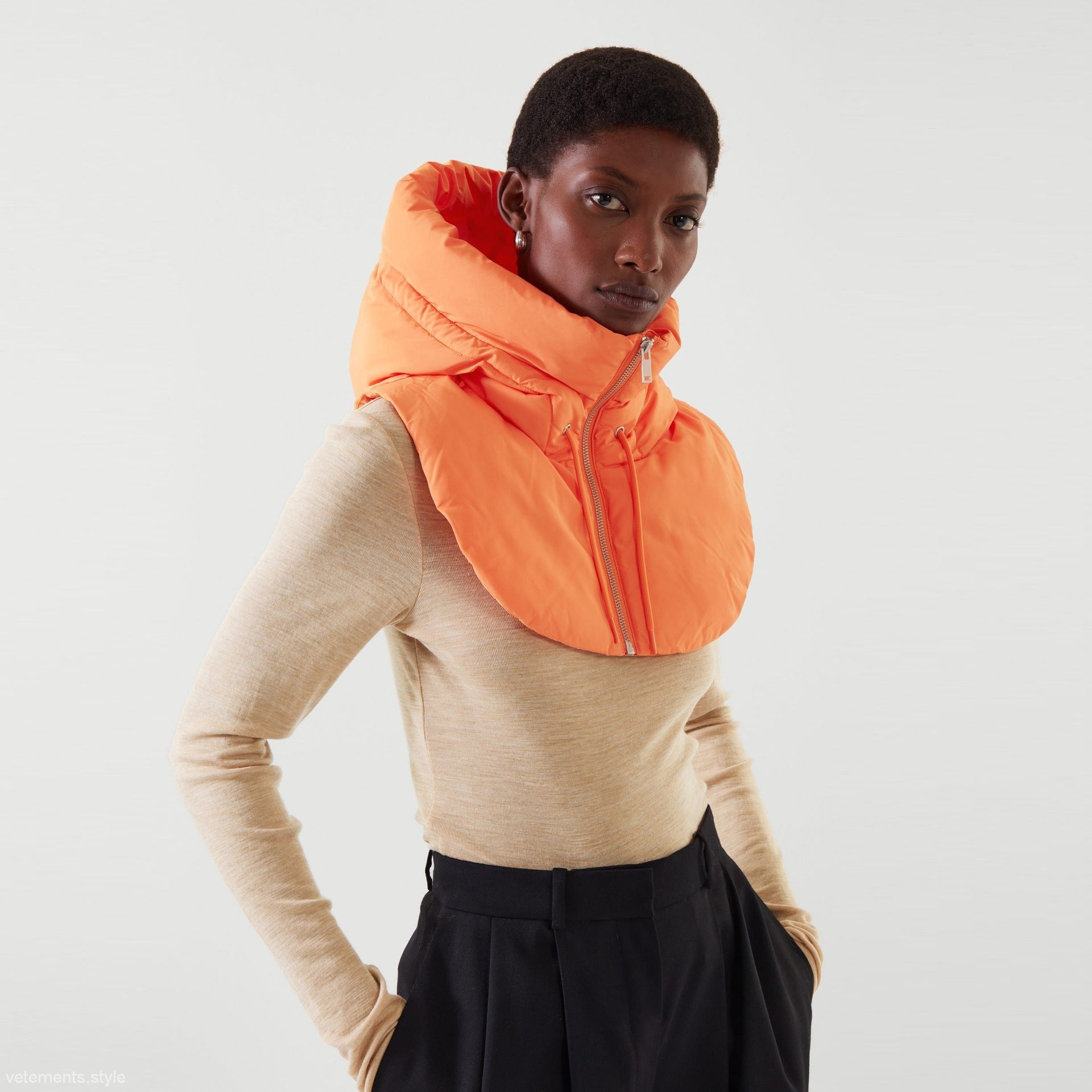 Orange puffer hood with zipper, ideal for stylish autumn winter accessories