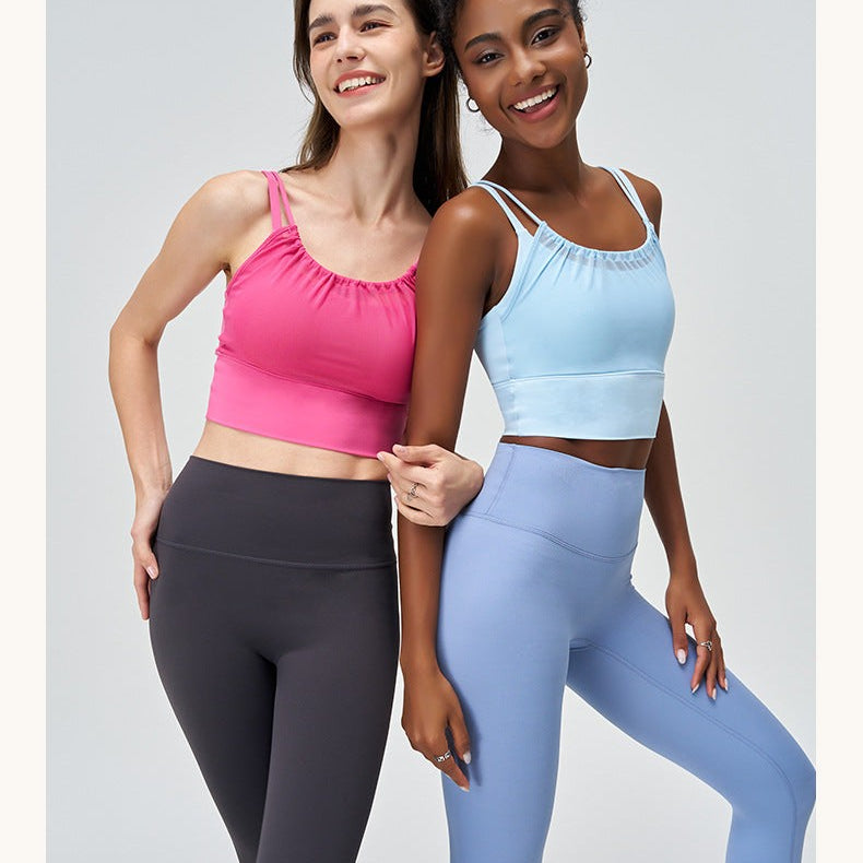 Two women in athletic wear featuring CUTE PLEATED MESH YOGA VEST in Glacier Blue