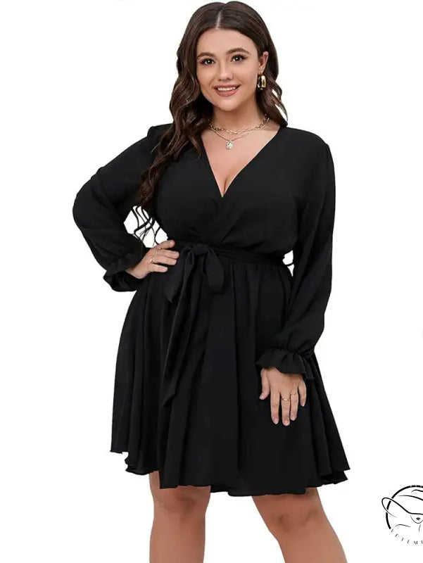 Black winter office midi dress with wrap style, tie waist, ruffled cuffs