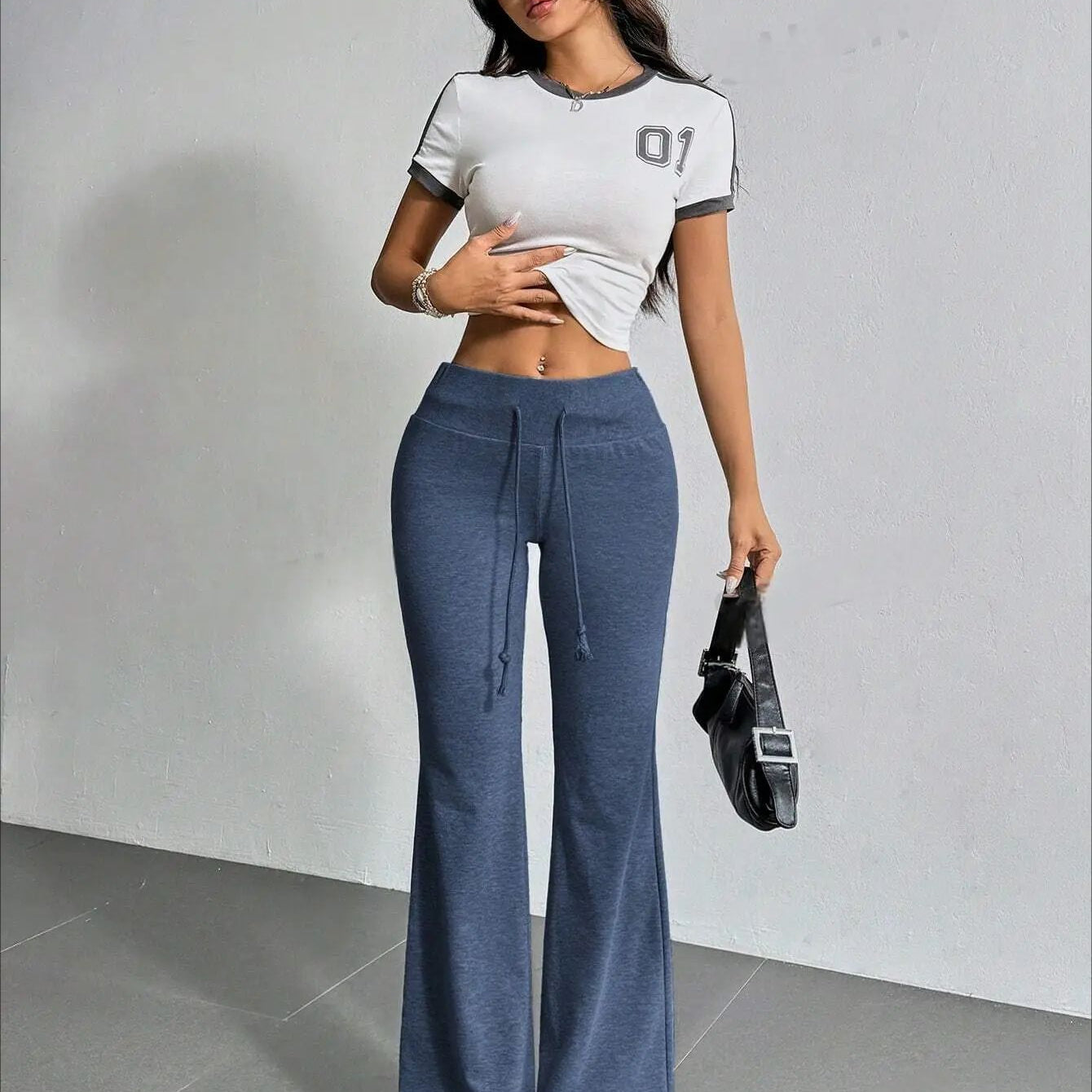 Blue drawstring flared pants from the High Waist Casual Solid Color Bell Bottom Pants collection
