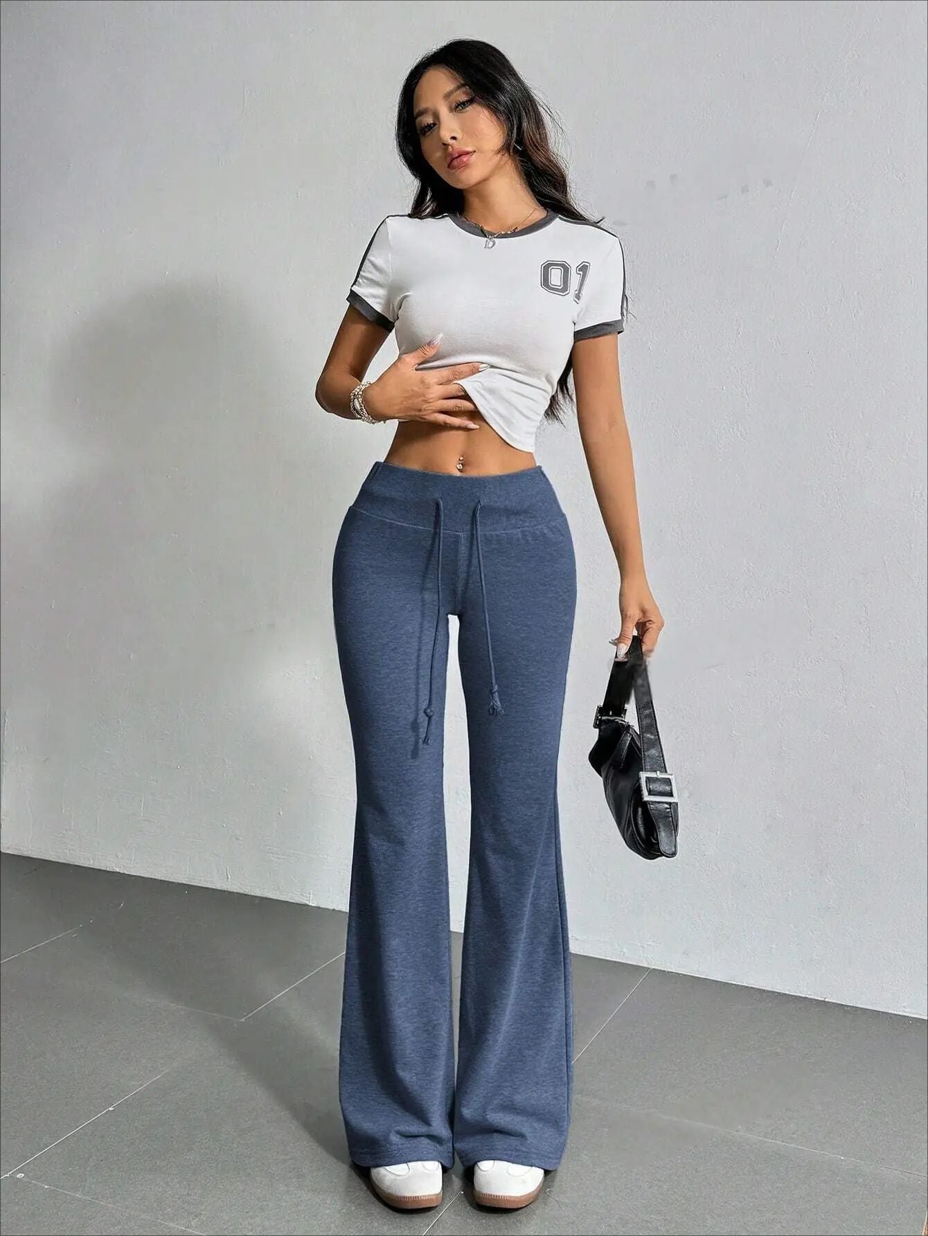 Blue drawstring flared pants from the High Waist Casual Solid Color Bell Bottom Pants collection