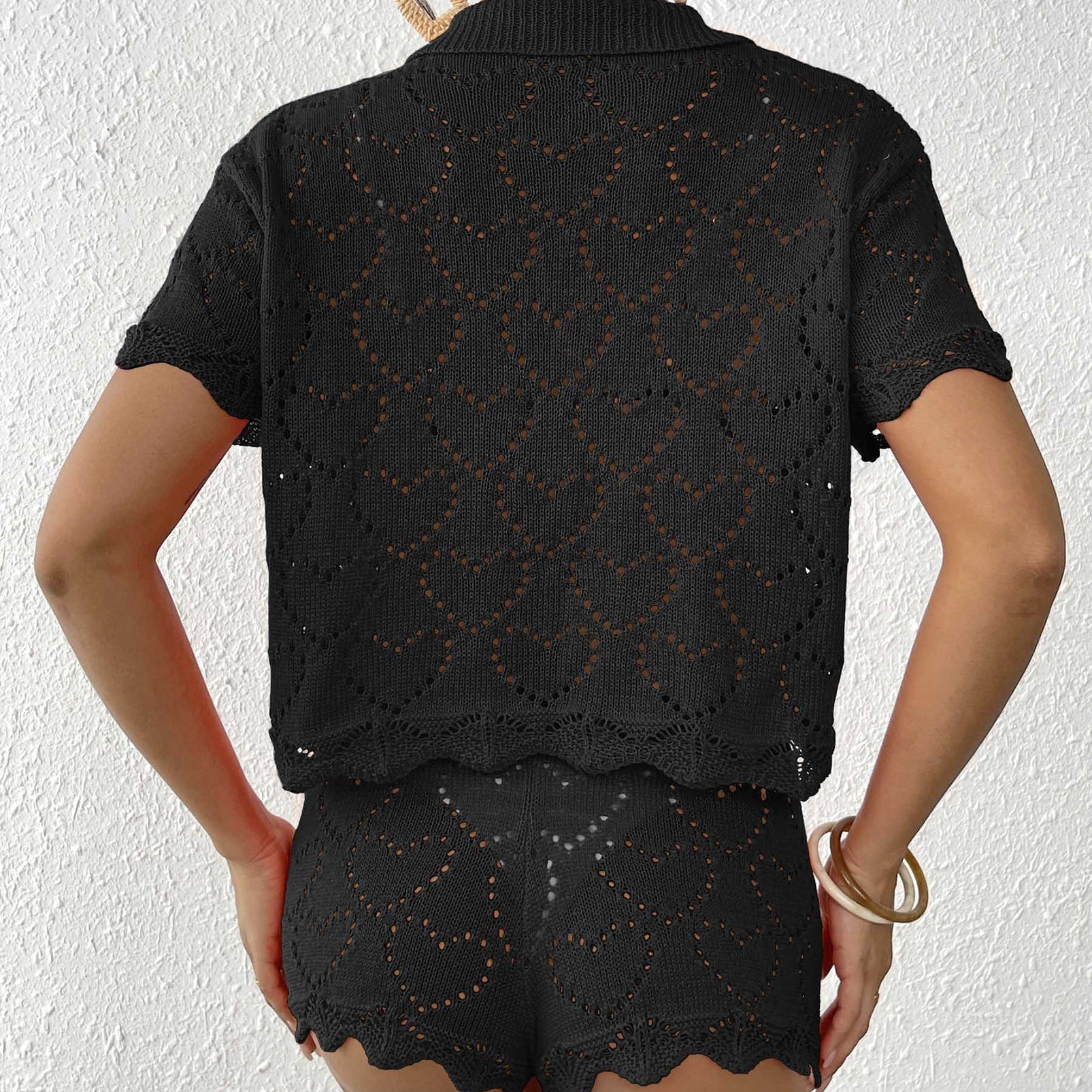 Black crochet knit shorts set from Beautiful Beach Sets showcasing modern fashion trends