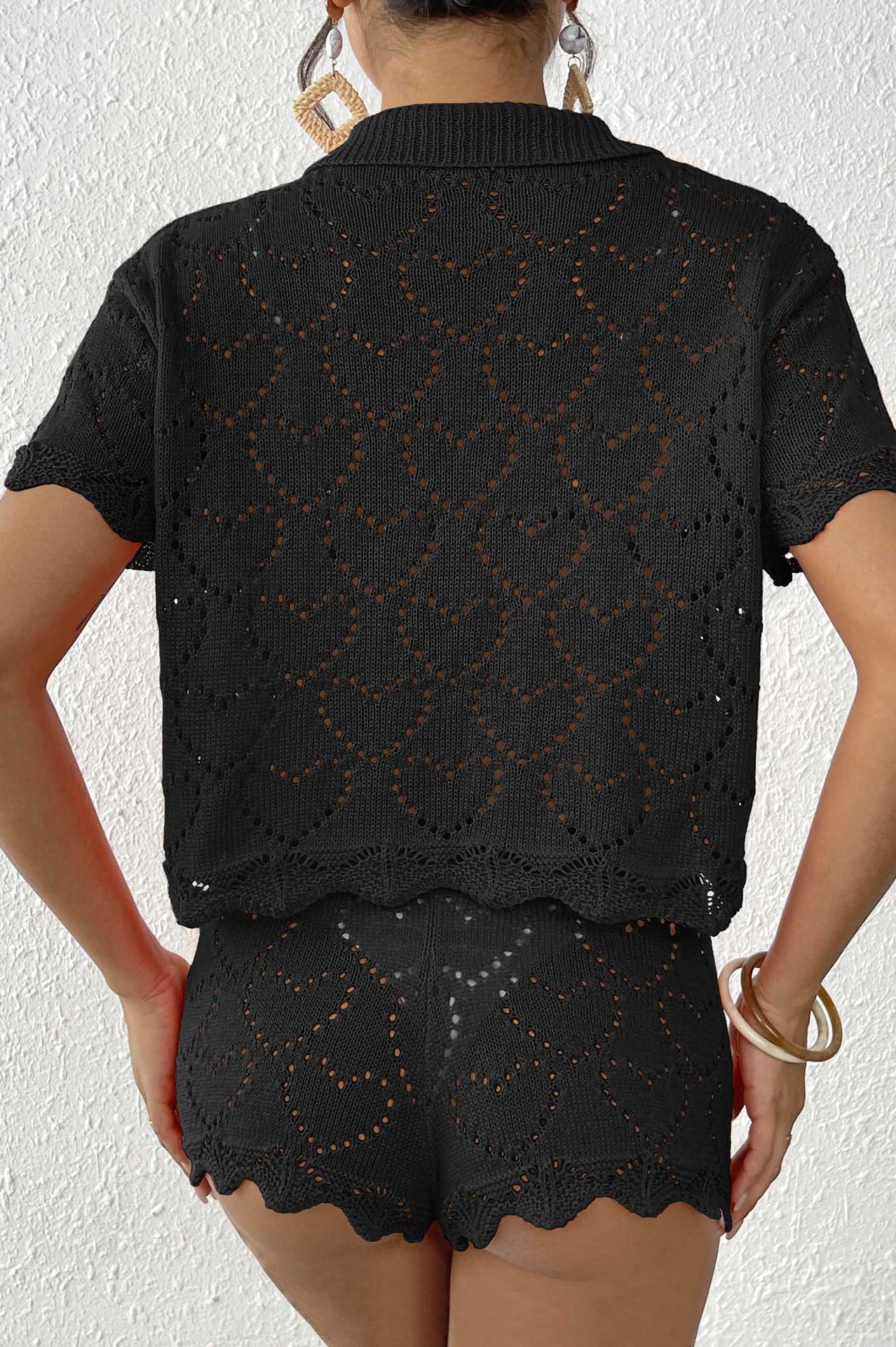Black crochet knit shorts set from Beautiful Beach Sets showcasing modern fashion trends