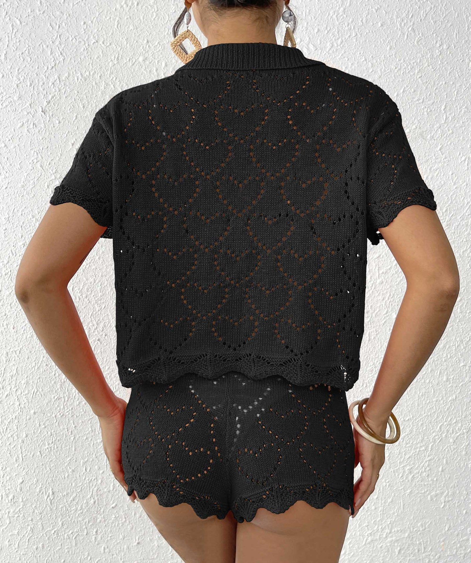 Black crochet knit shorts set from Beautiful Beach Sets showcasing modern fashion trends