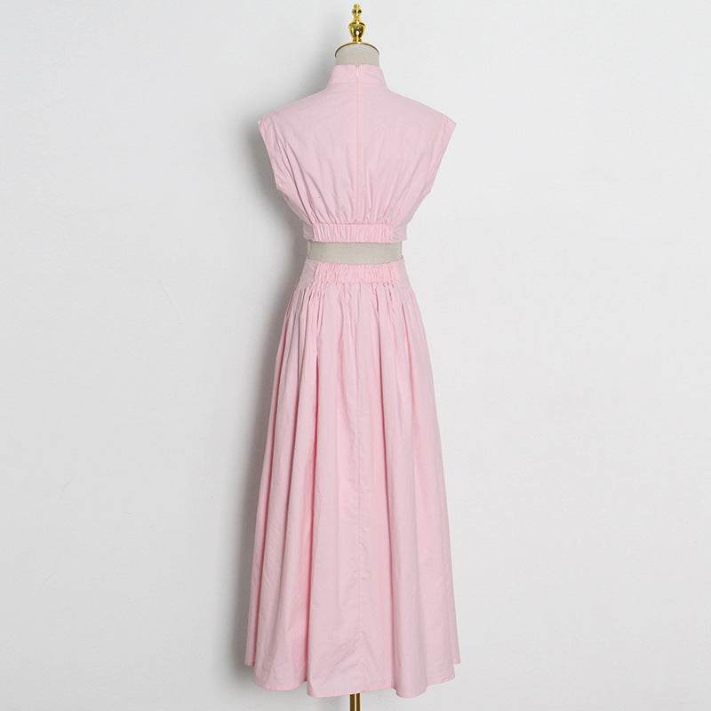 Pink two-piece vacation dress with stand collar and sleeveless cropped design