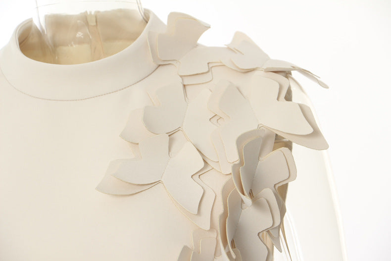 White winter butterfly shape evening dress with layered shoulder detail, perfect for fashion enthusiasts