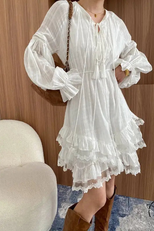 Stunning white ruffled layered mini dress in Langry fashion