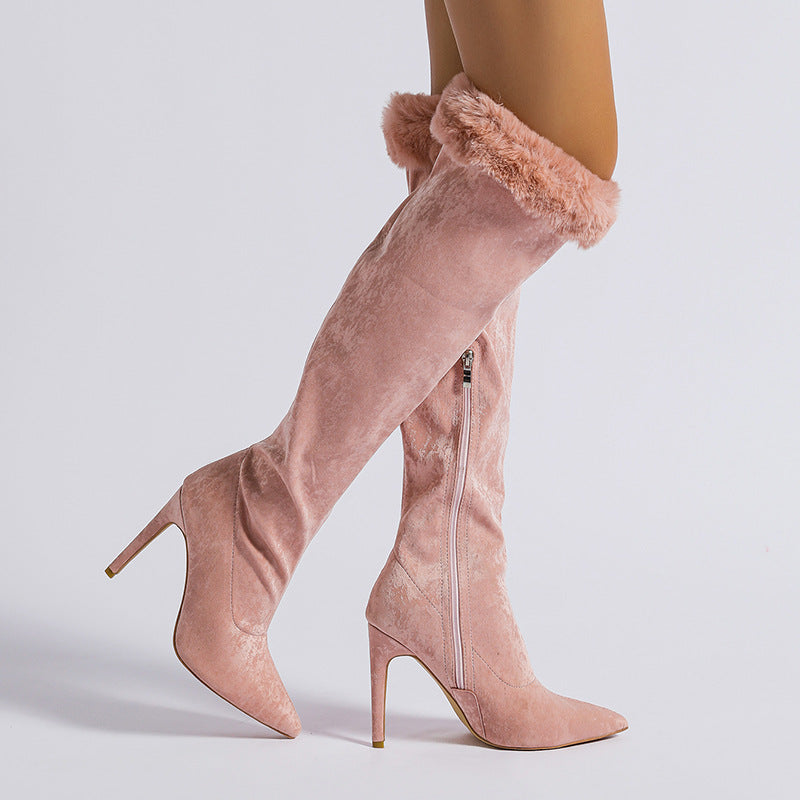 Pink thigh-high stiletto boots with faux fur trim, a stylish high leg boot