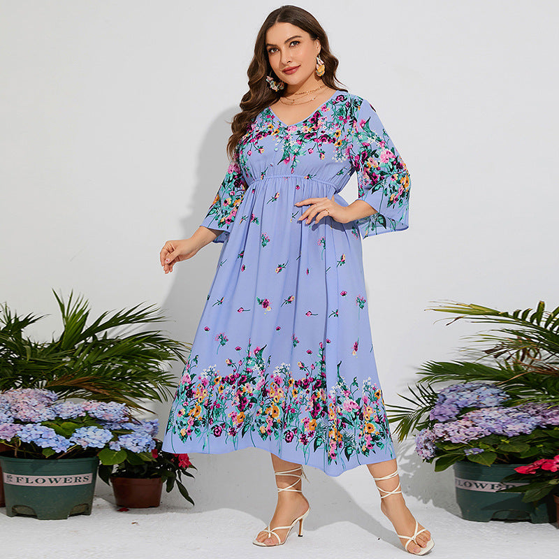 Plus-size spring dress with floral chiffon print, V-neck, and elastic waist for vacation