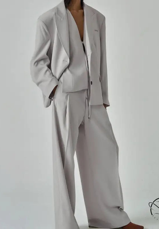 Sleek light gray long sleeve blazer set with relaxed fit wide-leg trousers