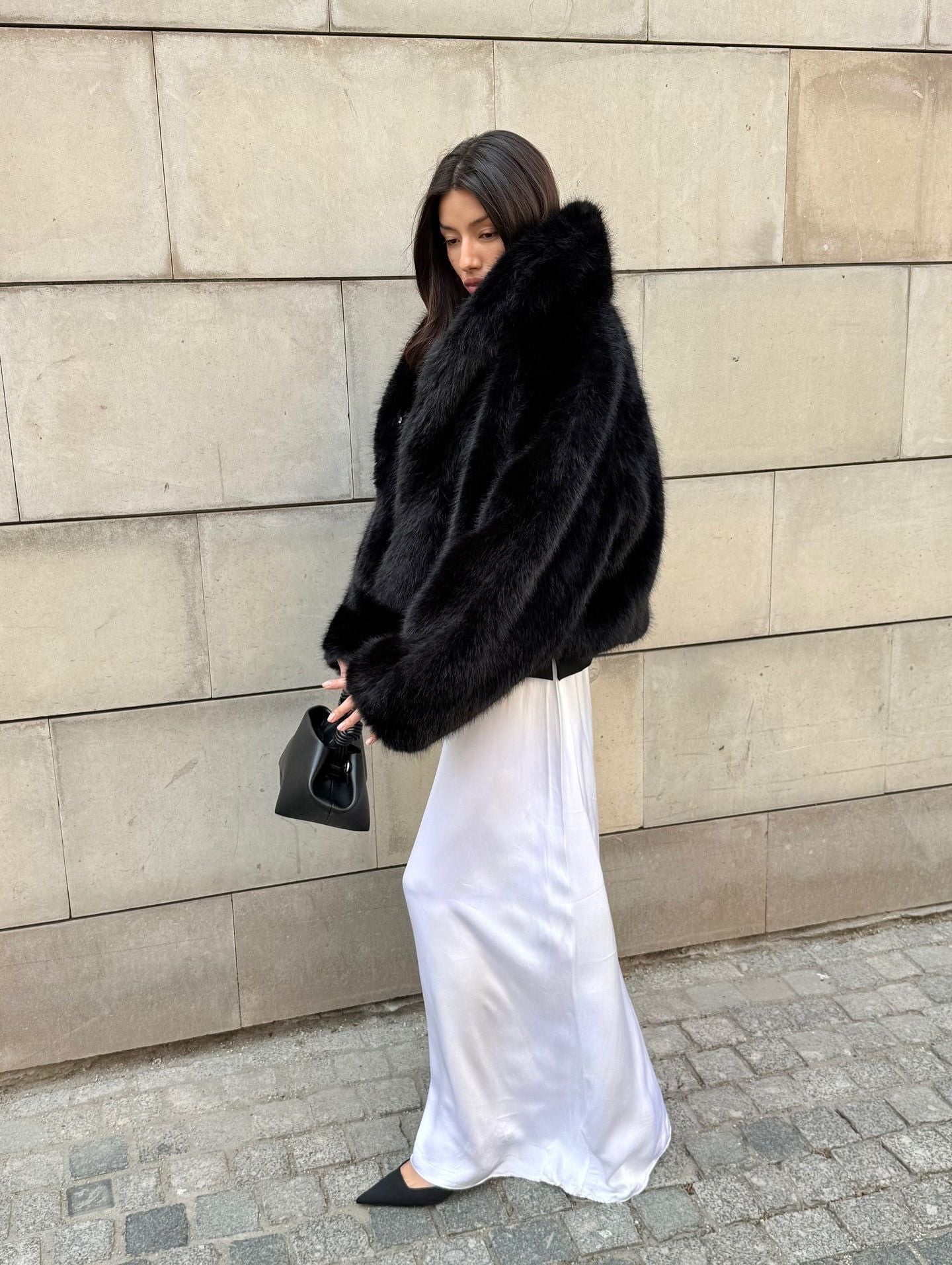 Luxurious black faux fur coat with fox collar from Prada