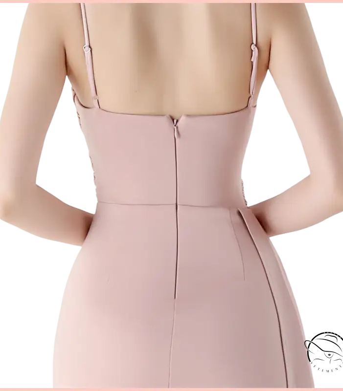 Elegant blush-pink satin langry evening dress with high slit