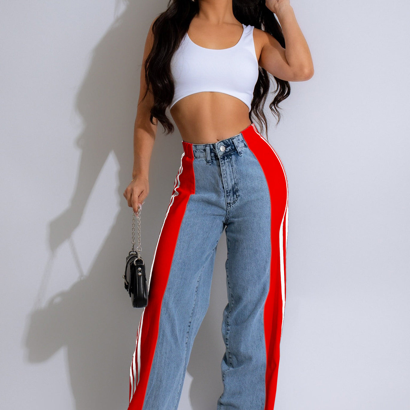 Two-tone jeans with red stripe panel, perfect for stylish casual wear in ملابس fashion