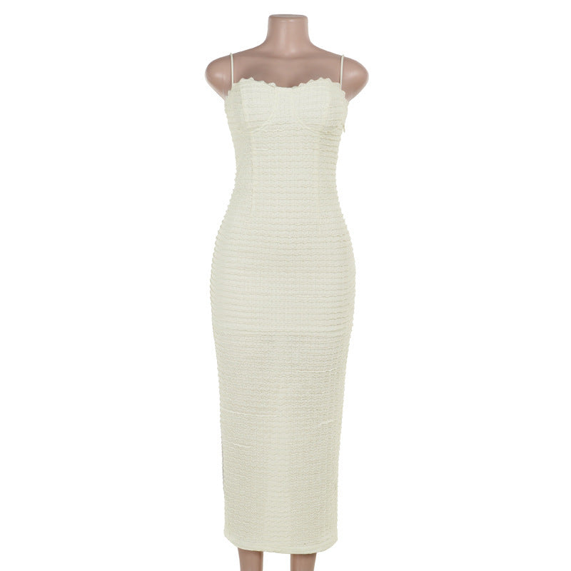 Cream-colored textured midi dress featuring a stylish split detail for autumn fashion