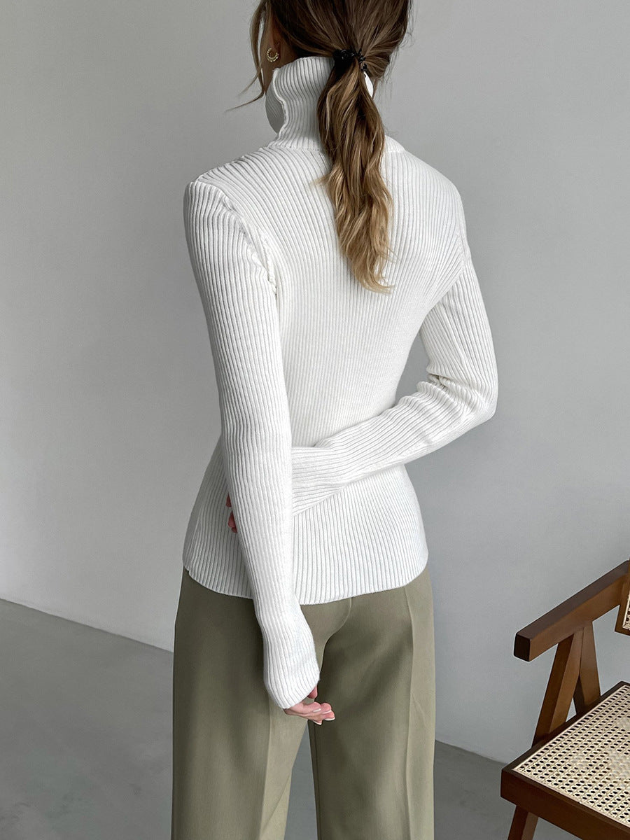 Langry fashion white ribbed turtleneck sweater with olive green pants