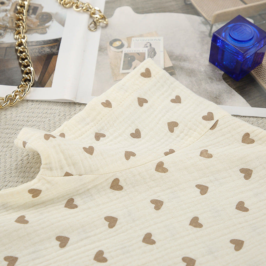 Cream-colored cotton linen fabric with brown heart patterns for summer cotton linen slit shorts set