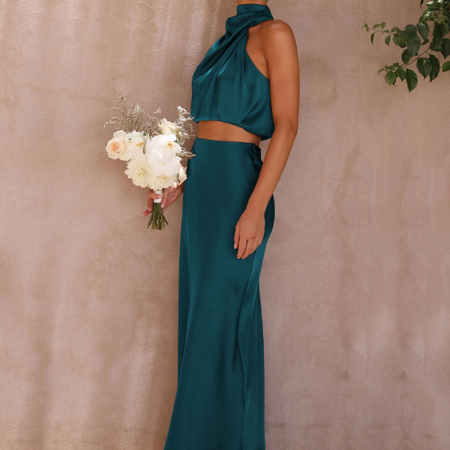 Emerald green draping skirt set featuring a sexy draping skirt for elegant style