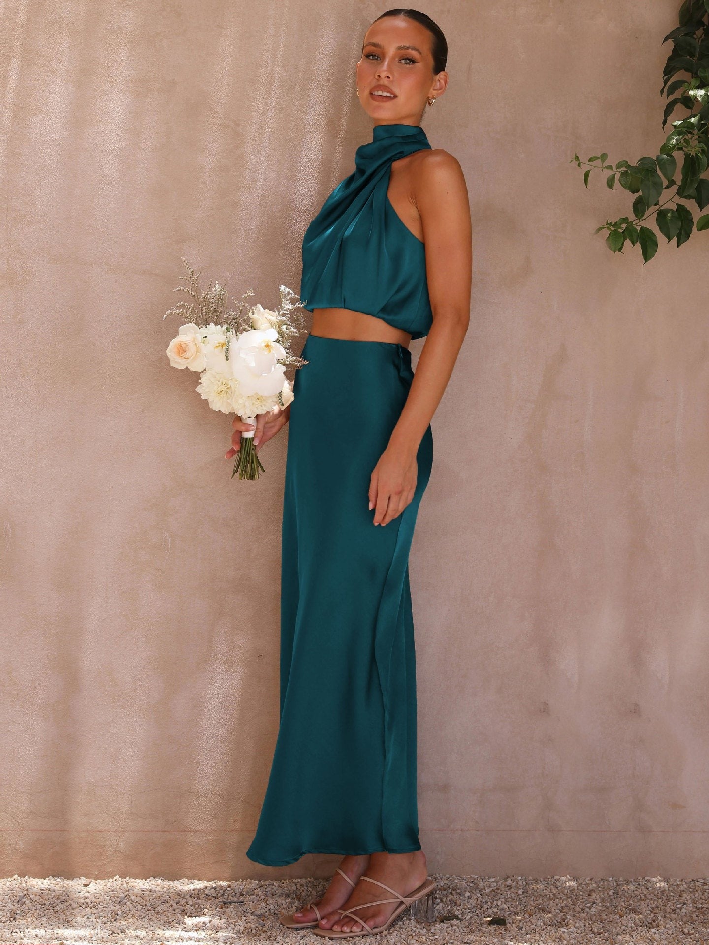Emerald green draping skirt set featuring a sexy draping skirt for elegant style
