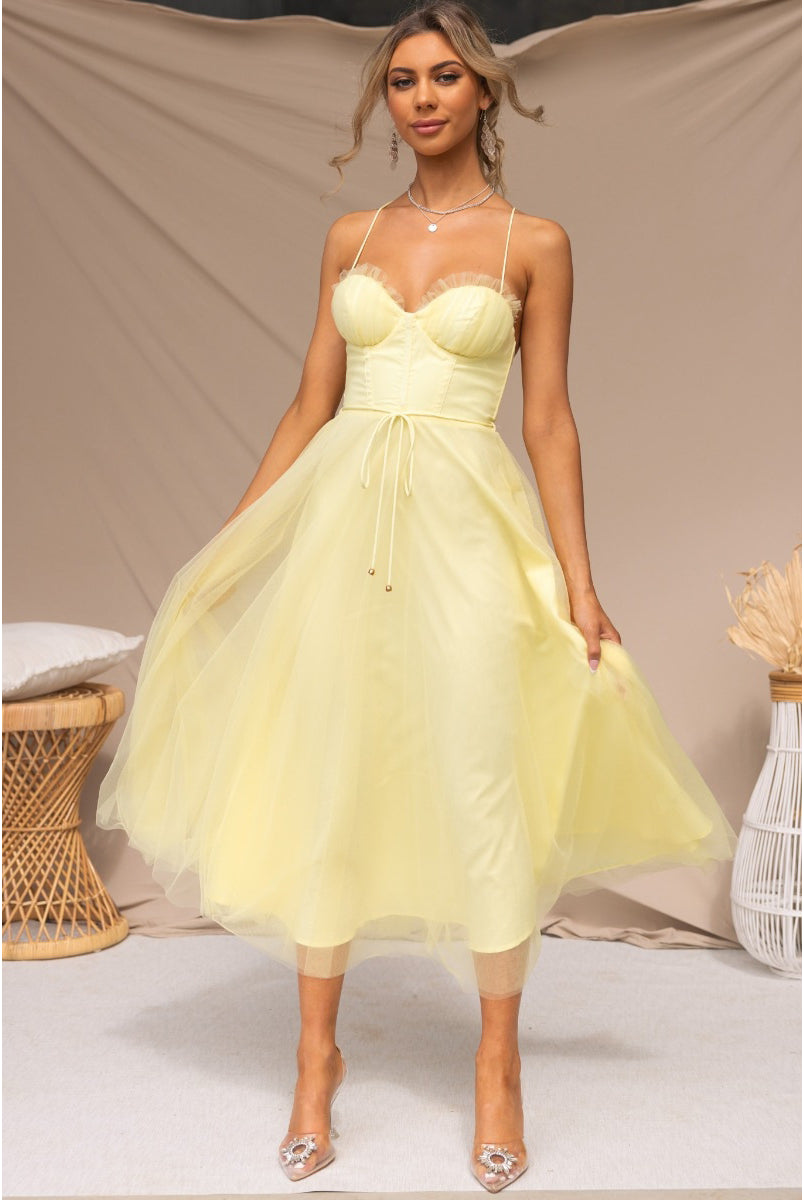 Elegant yellow tulle midi dress from ELEGANT SLING DRESS, perfect for a sexy sling dress look