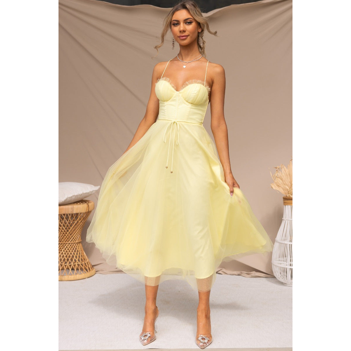 Elegant yellow tulle midi dress from ELEGANT SLING DRESS, perfect for a sexy sling dress look