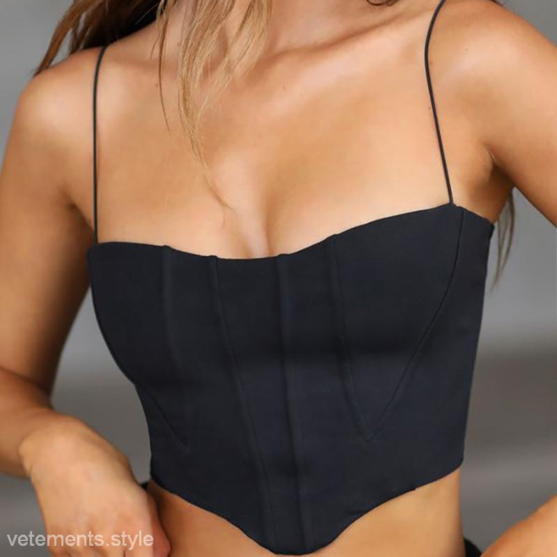 Black black corset-style crop top with open chest boning for a stylish look