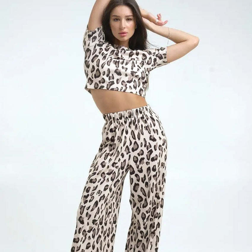 Women’s leopard print slim fit crop top and wide-leg trousers set for stylish home wear
