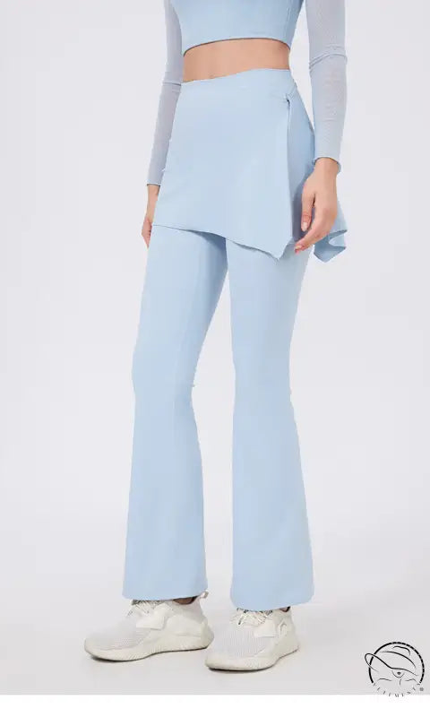 Light blue high-waist hip lifting nude feel yoga pants with white sneakers