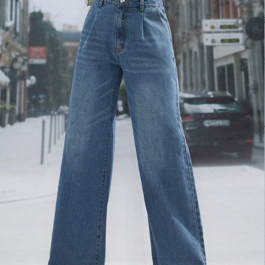 High-waisted wide-leg denim trousers with pleats, stylish and flattering for a modern look
