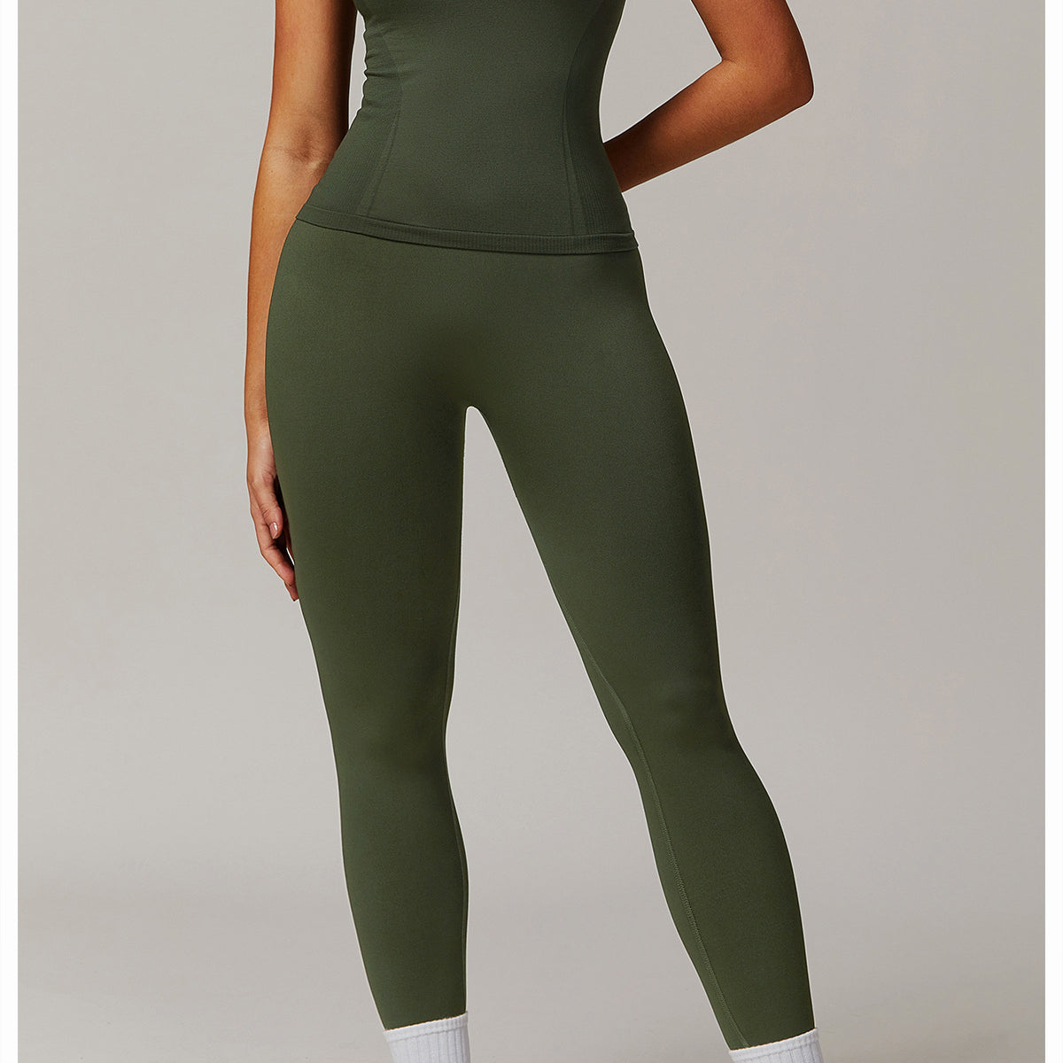 Olive green athletic set featuring Thread Seamless Short Sleeved T-shirt for yoga fashion