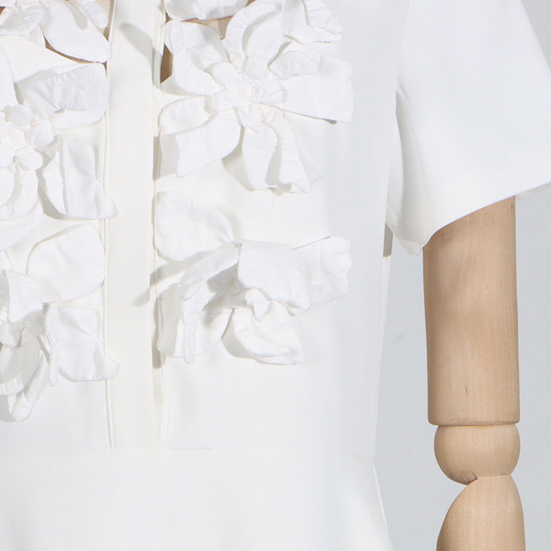 White dress with floral embellishments from French Tea Break Summer Polo Collar collection