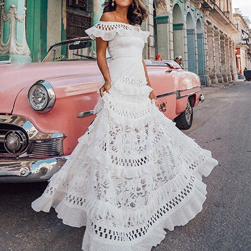 Elegant off-the-shoulder white lace dress showcasing captivating fashion and ملابس style