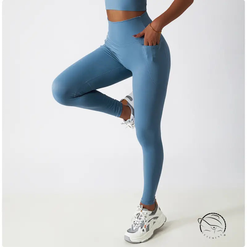 Light blue high-waisted yoga pants with white sneakers, Langry fashion