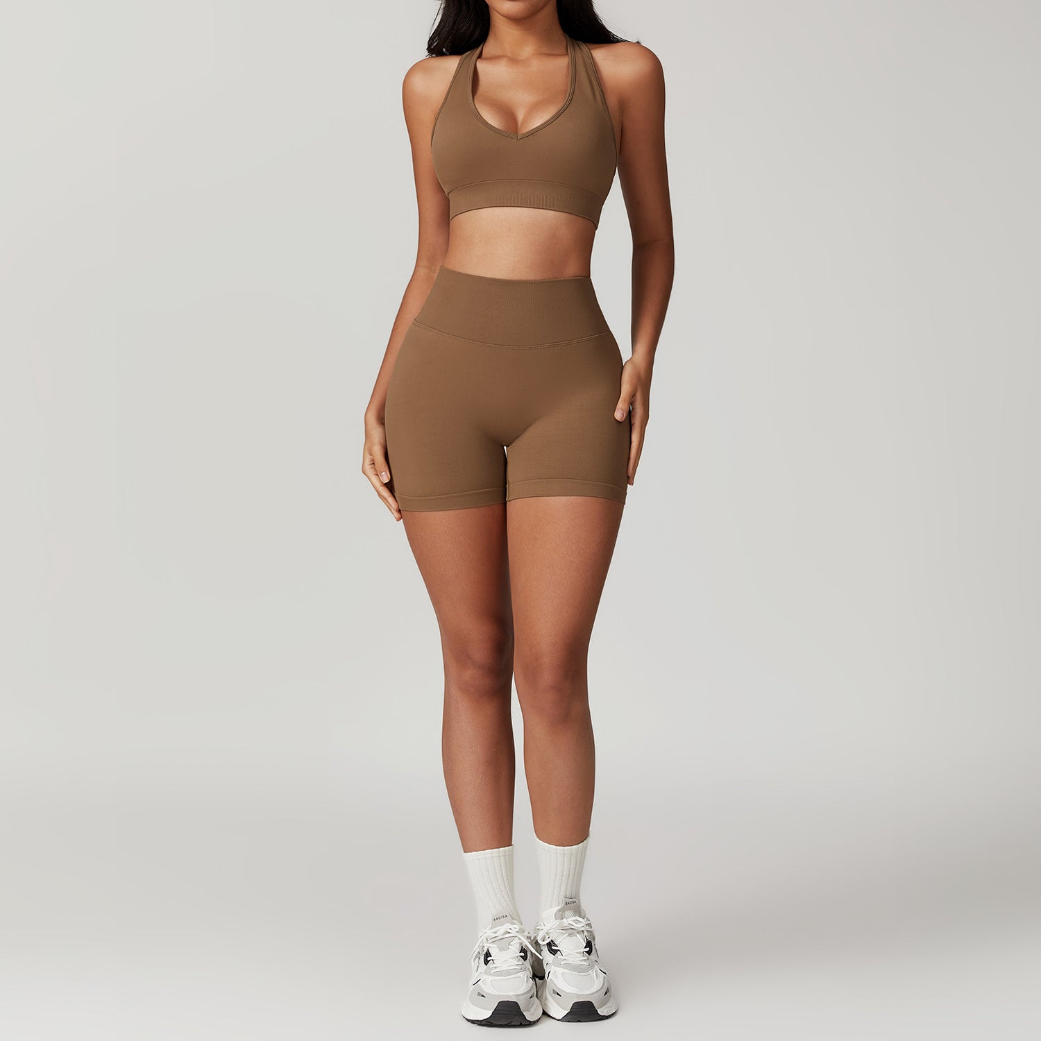 Brown halter-neck sports bra and shorts set from Seamless Yoga Suit collection