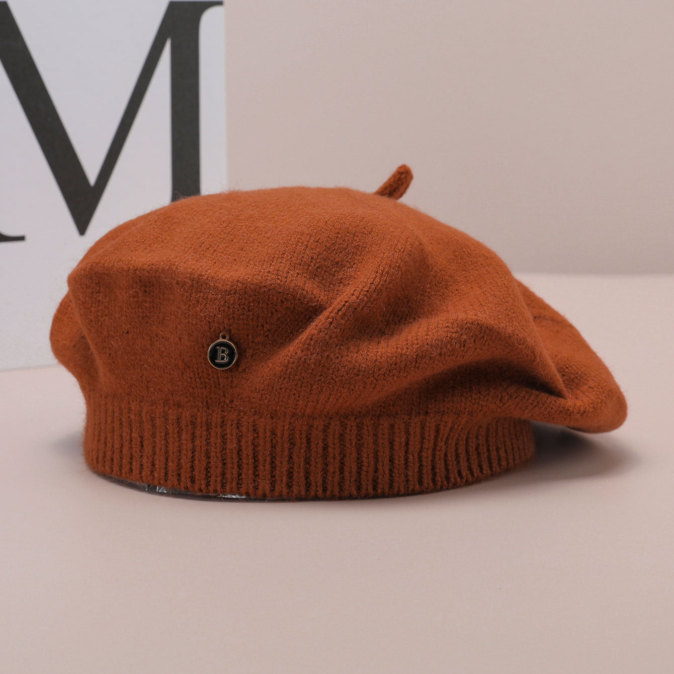 Knitted rust-colored beret from Langry fashion collection, perfect in ملابس 스타일