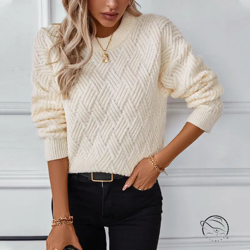 Cream cable knit crew neck sweater with herringbone pattern and ribbed details
