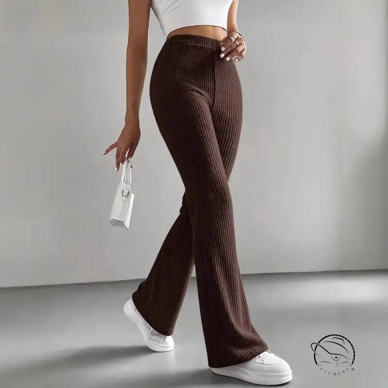 Casual knitted ribbed flared brown match pants with high waist and white sneakers