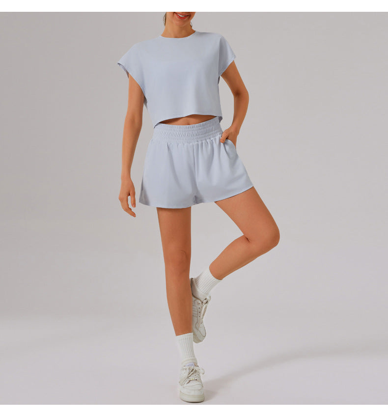 Light blue Loose Sports Yoga Fitness Set with white sneakers and socks for stylish workouts