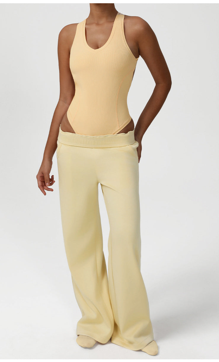 Langry yellow ribbed knit bodysuit with waist cutout, fashion ملابس