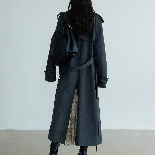 Casual langry fashion trench coat in charcoal gray with black leather boots