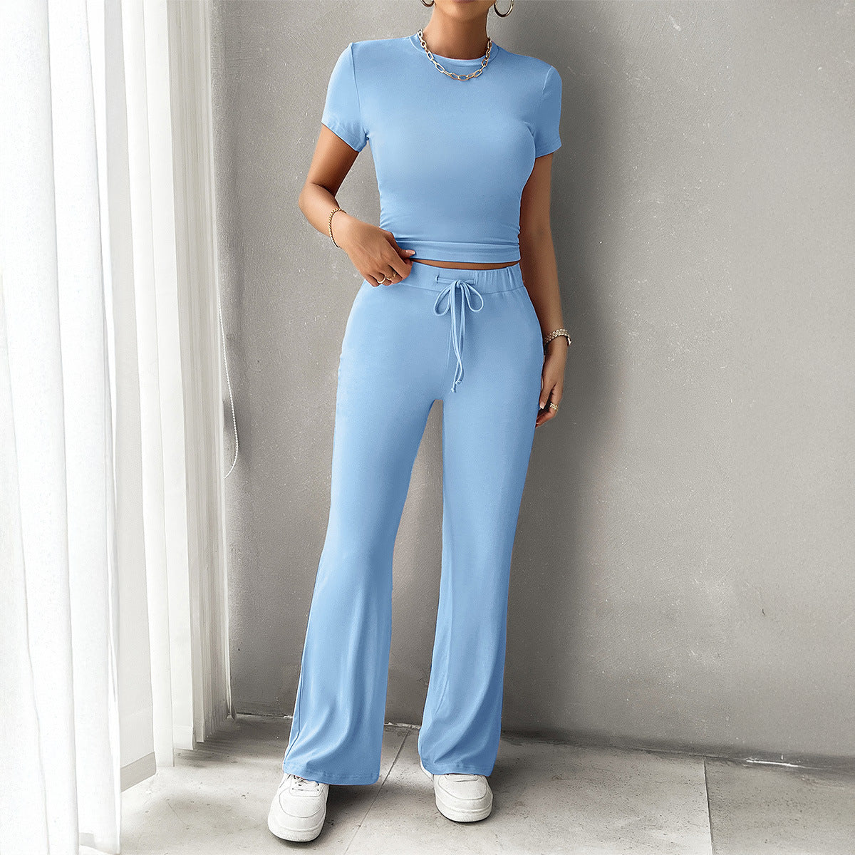 Light blue langry fashion yoga two-piece set with short top and flared pants