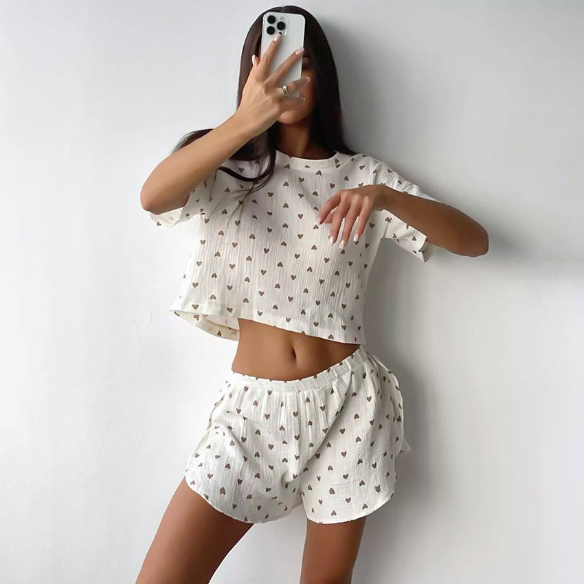 White cotton linen two-piece set with dark heart patterns and slit shorts for summer