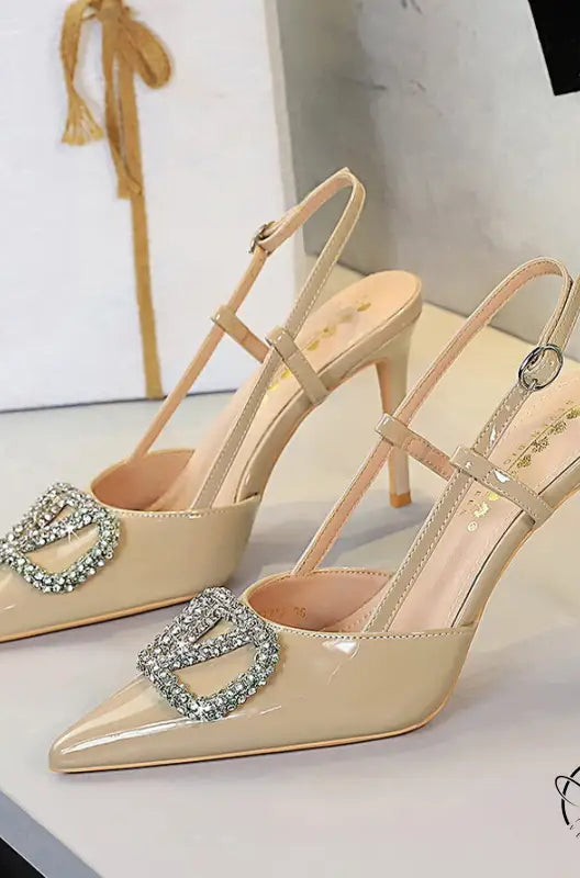 Classy High Heels: beige patent leather sandals with rhinestone buckles