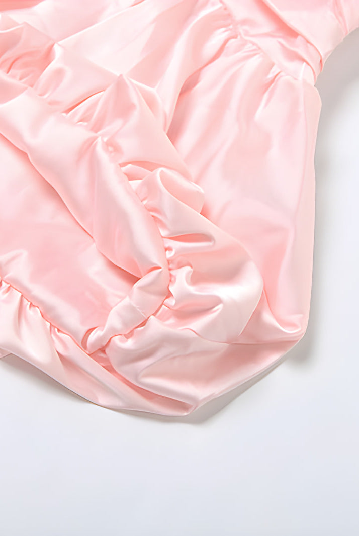 Pink ruffled fabric showcasing gathered edges in Women Clothing Summer Collection