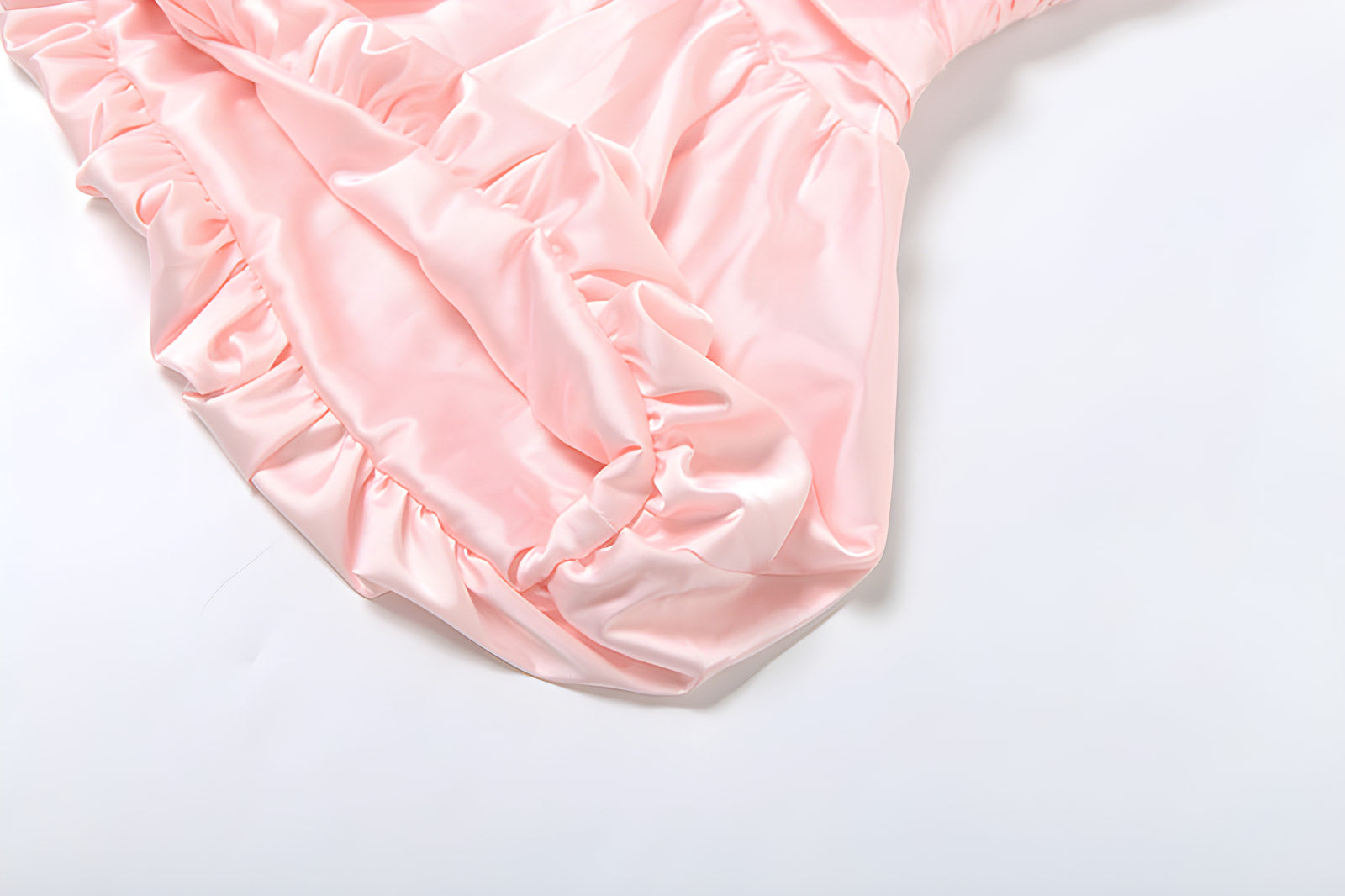 Pink ruffled fabric showcasing gathered edges in Women Clothing Summer Collection