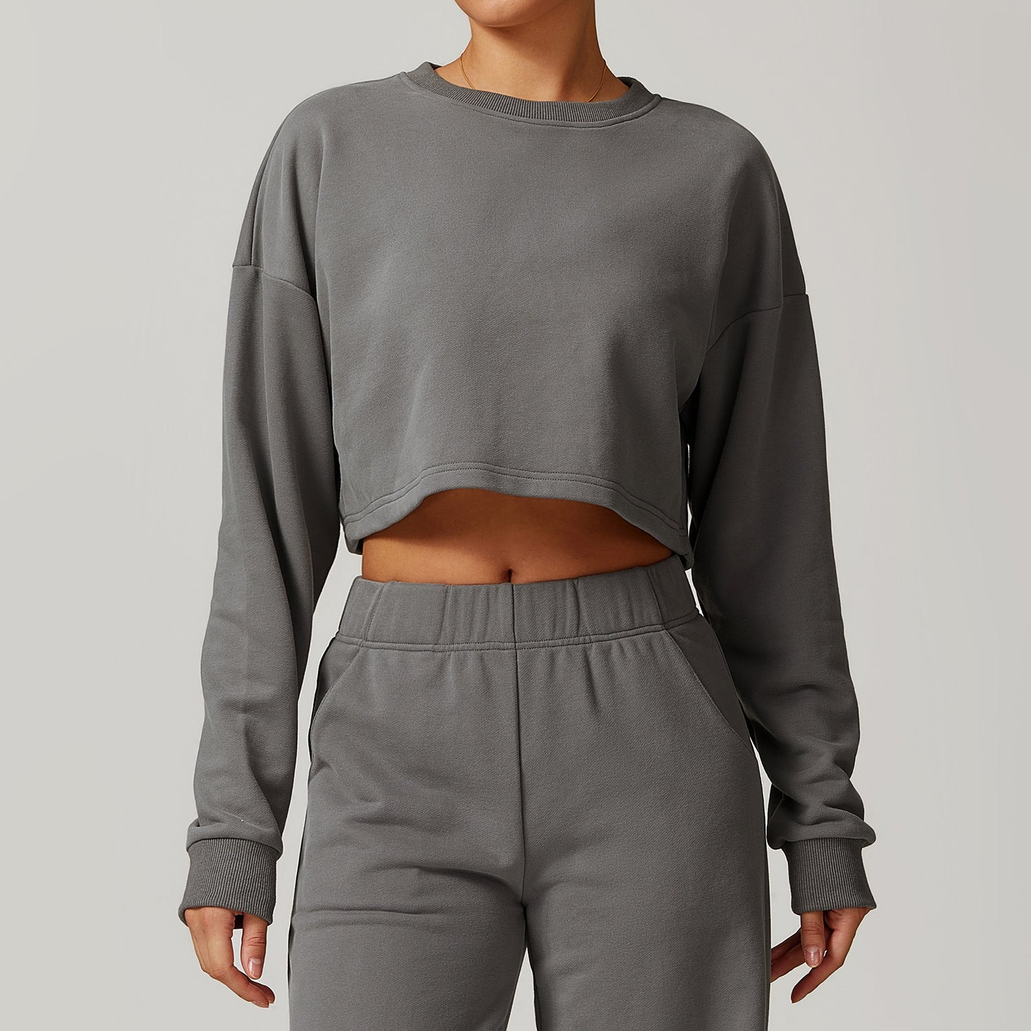 Gray long sleeve cropped sweatshirt and pants set for autumn winter fashion