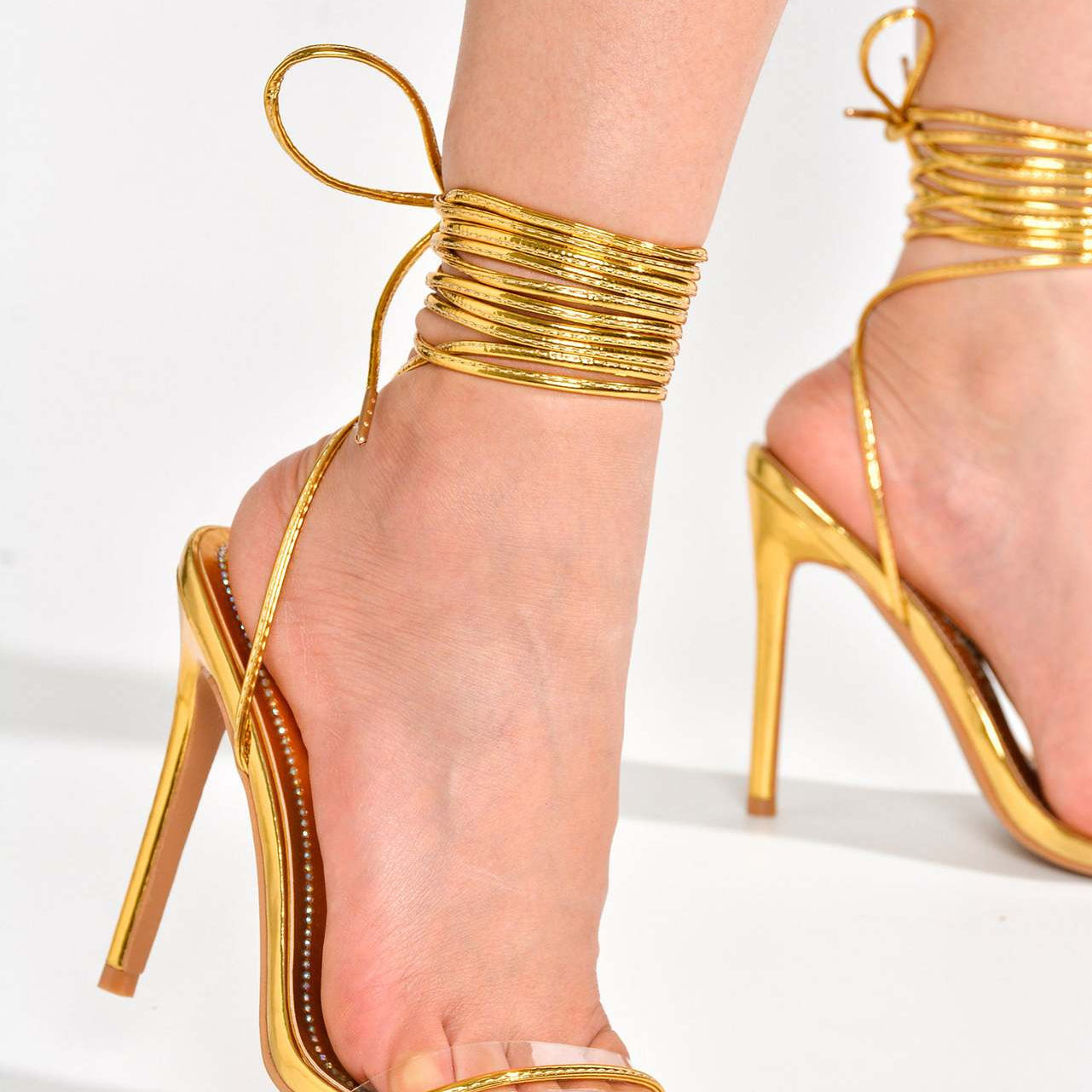 Gold strappy stiletto heels with ankle ties for stylish fashion and ملابس_LOOKS